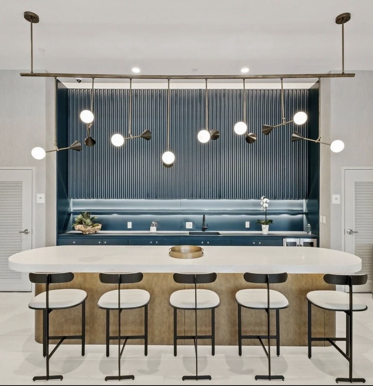 Modern kitchen with stylish lighting.